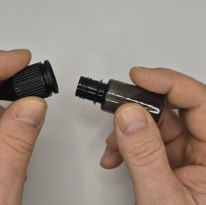 10 ml Amber Plastic Bottle with Black Cap for E-Liquid Packaging